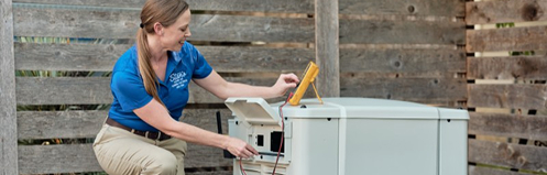 Stan's employee checking a generator