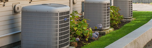 Multiple HVAC units in a yard