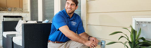 Stan's employee repairing an outdoor electrical socket