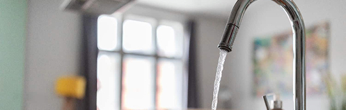 Kitchen faucet running water