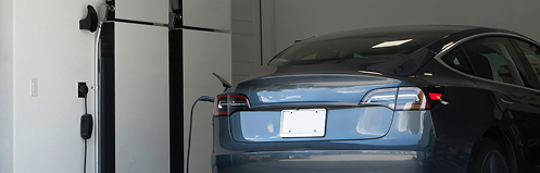 Car plugged in to an EV charger