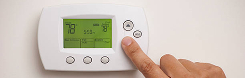 Hand adjusting thermostat