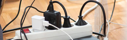Cords plugged into surge protector