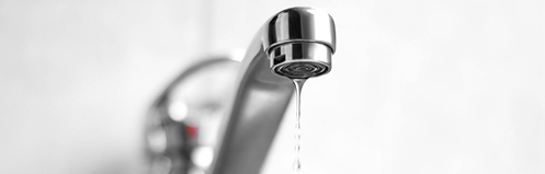 Bathroom sink dripping water