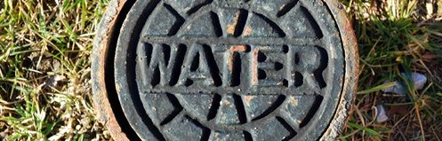 Sewer that says "water" on the top
